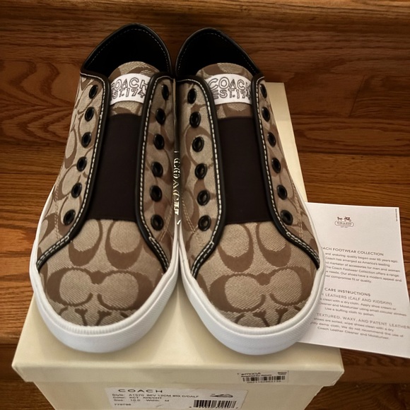 Coach Canvas Slip-On Sneakers with Brown and Black Accents - Picture 1 of 6